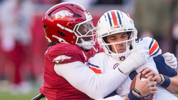 Razorbacks Trajan Jeffcoat downs Auburn quarterback Payton Thorne